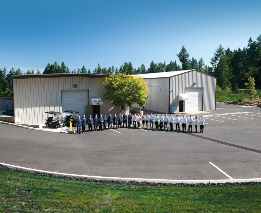 dti staff photo outside of facility